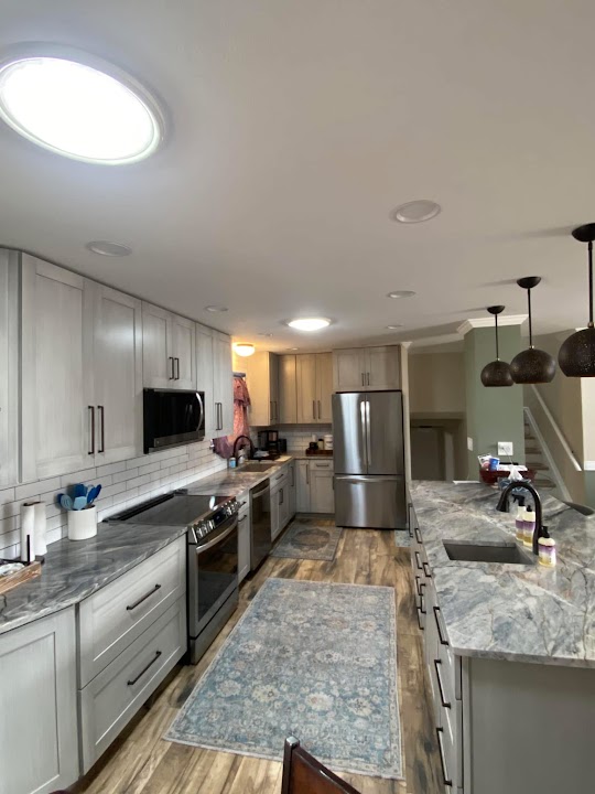 Real gray cabinet kitchen remodel by Yovani's Repair LLC